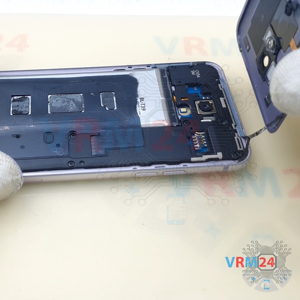 How to open the back cover on LG Q7 Q610