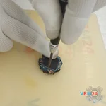 Unscrew one screw
